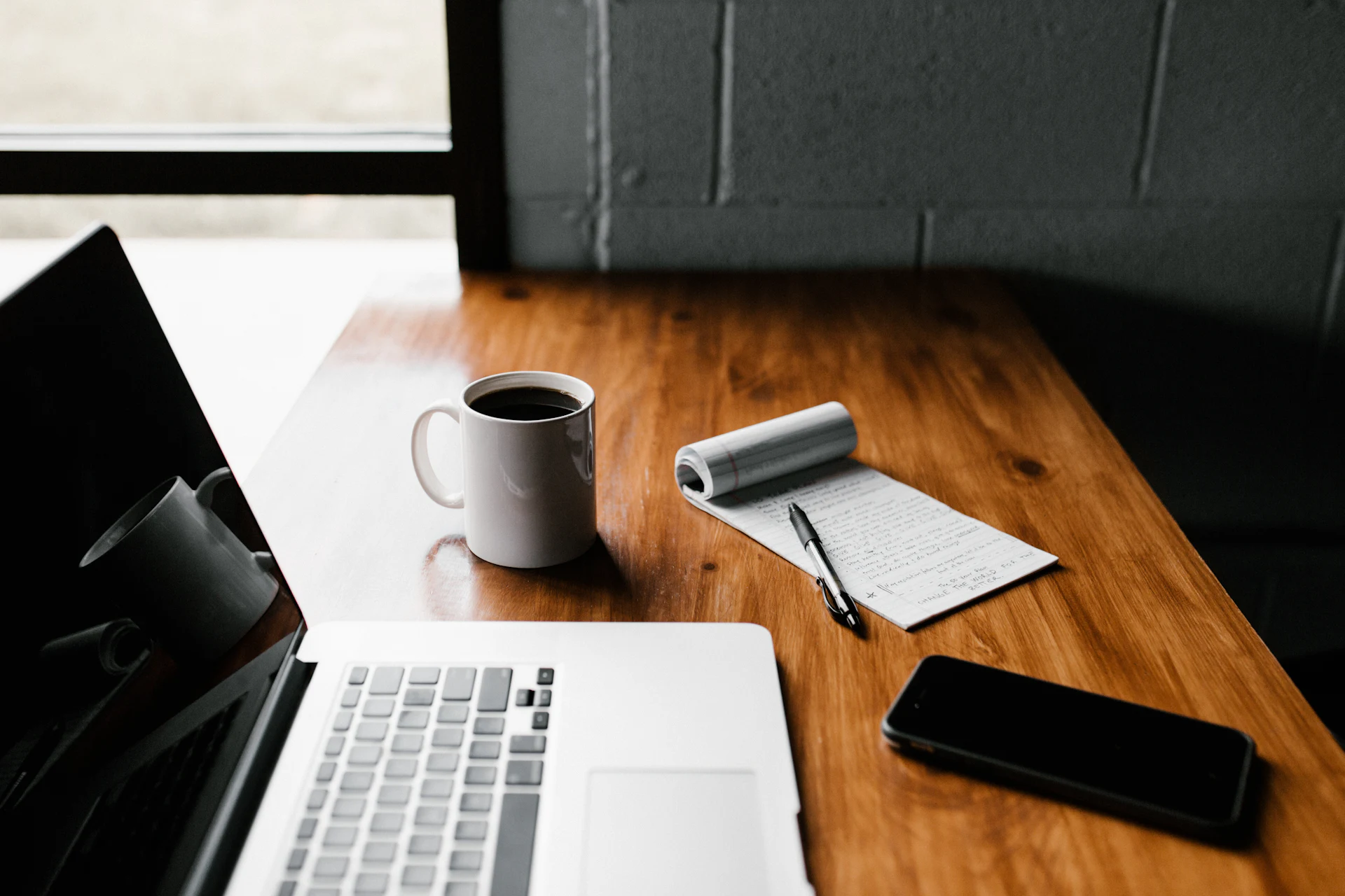 Content marketing services - writer working on a laptop