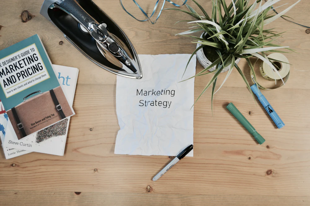 Digital marketing strategy plan and notes on a desk