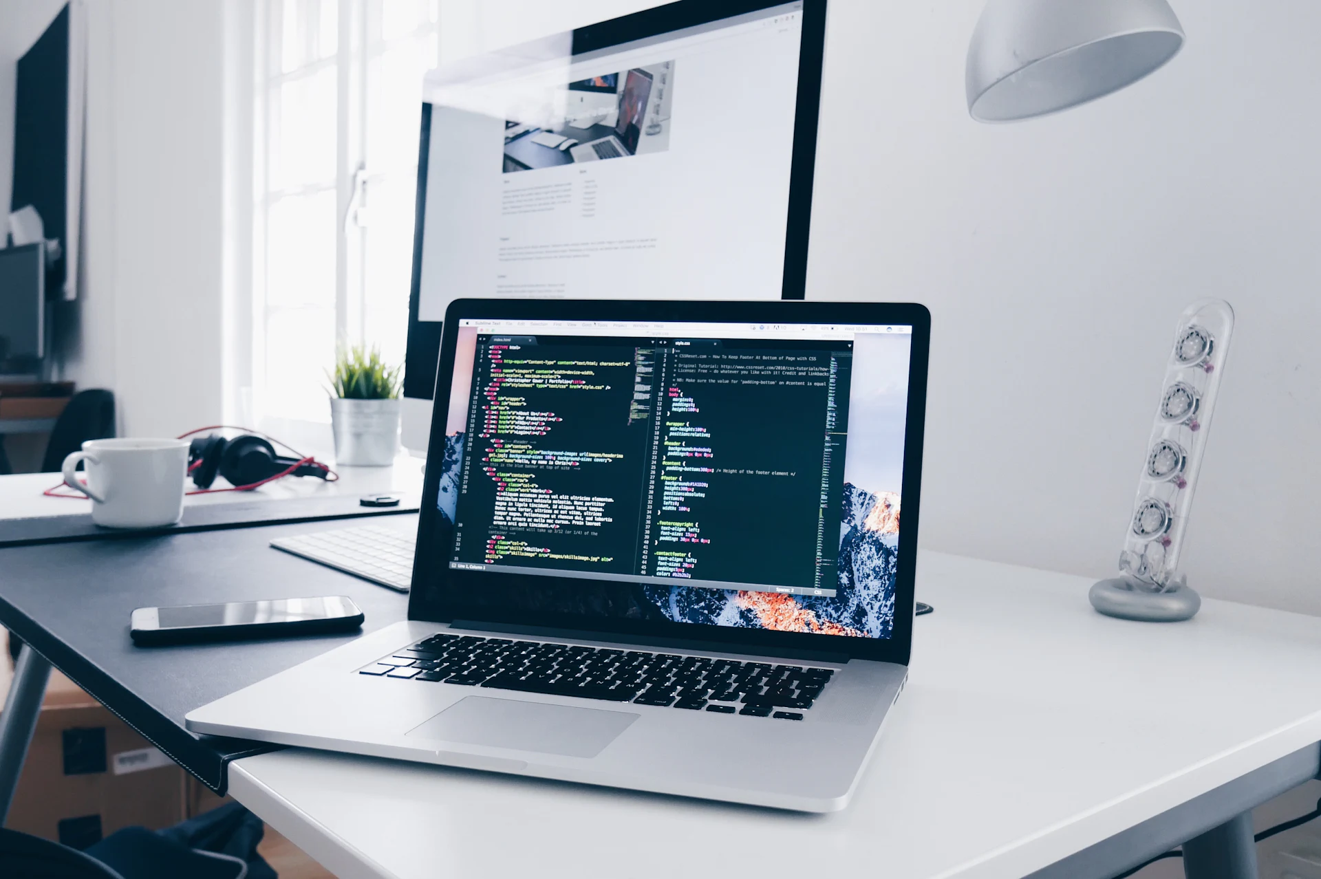 WordPress development services - developer laptop with code